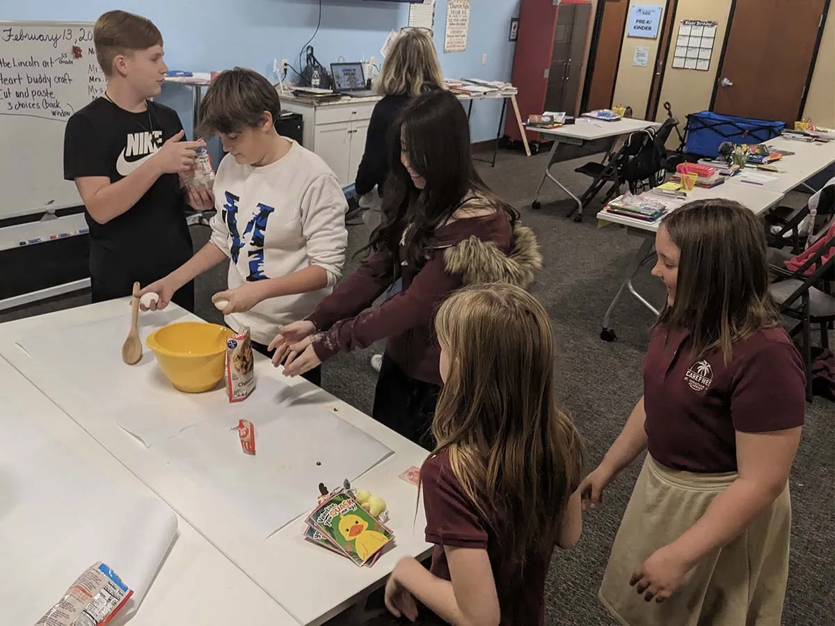 elementary-classroom-cooking-baking-activity Elementary students cooking and baking together in classroom activity